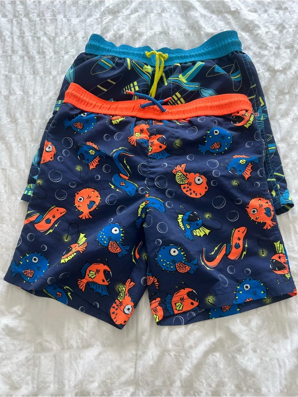 2 Pairs. Boys Navy Print Swim Shorts